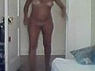 MILF naked on a hidden cam
